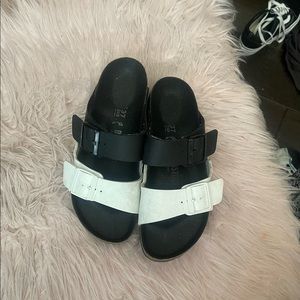 White and black Birkenstocks
